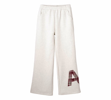 White sweatpants with a plaid letter 'A' on a white background