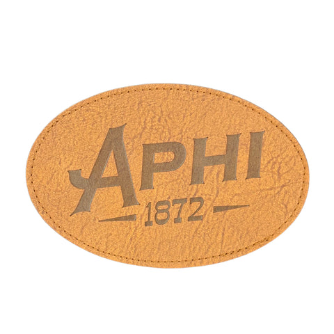 Brown leather patch with 'APHI 1872' text on a white background