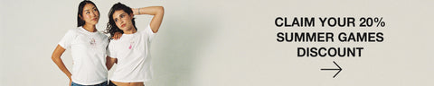 Two women wearing white big and little sorority baby tees, standing side by side against a light gray background. Text on the right side of the image goes to discount code page